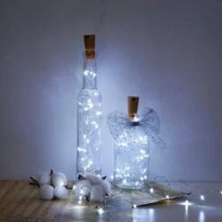 Cynzia 20 LED Wine Bottle Lights With Cork, 15 Pack Battery Operated Cork Shape Fairy Light Waterproof Mini Copper Silver Wire String Lights For Party, Wedding, Christmas, Bedroom Decor (Cold White) -Department 56 Shop 41YbWCn783L
