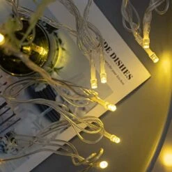 YULETIME 100 Feet 300 Count Warm White LED String Lights With 8 Models Adapter, 4" Spacing Plug-in Clear Wire Wide Angle 5mm Christmas Lights (Warm White - Multimode) -Department 56 Shop 512yCcp08UL