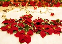 HOMESEASONS Pack Of 2 Pre-Lit Velvet Artificial Poinsettia 6 Feet Garland With Red Berries And Holly Leaves - 3AA Battery Operated Indoor And Outdoor Use (2, Red) -Department 56 Shop 515k5I0yUbL