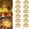 JETENCN 12 Pack 6.9ft 20 LED Fairy Lights Battery Operated, Waterproof Copper Wire Lights, Mini String Lights Firefly Starry Lights For Christmas Wedding Party Mason Jar Decoration (Warm White) -Department 56 Shop 516y4RYf62L