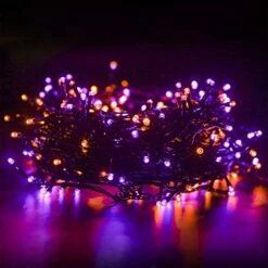 FUNPENY 300 LED Indoor String Lights, 100 FT Plug In Waterproof String Lights With 8 Modes For Halloween Thanksgiving Christmas Garden Decoration, Indoor And Outdoor Decorations (Purple-Orange) -Department 56 Shop 51GFyfk2lmL