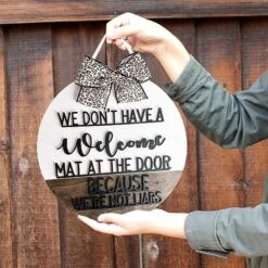 Akloker We Dont Have A Welcome Mat At The Door Hanging Doorplate Funny Wooden Front Door Hanger With Rope For Front Door/Window Wall Hanging Decor -Department 56 Shop 51GmneucrLL