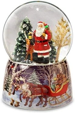 Santa And Reindeer Christmas Snow Globe By The San Francisco Music Box Company
