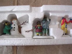 Dept 56 Christmas In The CityPlaying In The Snow (55565)