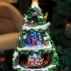 Moments In Time Disney Licensed Animated Christmas Tree, Christmas Tabletop Decor With LED Lights, 8 Classic Christmas Songs - Power Adapter (Included) (17.8" H X 11.2" W X 11.6" D) -Department 56 Shop 51RfZAa5lbL