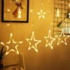 Twinkle Star 12 Stars 138 LED Curtain String Lights, Window Curtain Lights With 8 Flashing Modes Ramadan Decoration For Christmas, Wedding, Party, Home Decorations (Warm White) -Department 56 Shop 51TOhCCBJLL