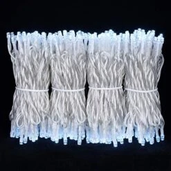 YULETIME 100 Feet 300 Count Warm White LED String Lights With 8 Models Adapter, 4" Spacing Plug-in Clear Wire Wide Angle 5mm Christmas Lights (Warm White - Multimode) -Department 56 Shop 51TbKyO4gvL. AC