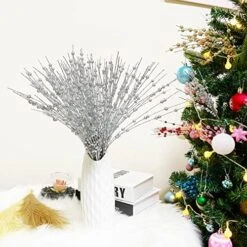 RIFNY 45 Packs Christmas Artificial Green Pine Needles 10 Inch Christmas Floral Picks Artificial Pine Branches For DIY Garland Wreath Crafts Christmas Tree Gift Wrap Home Garden Decoration -Department 56 Shop 51a4hhUWJL. AC