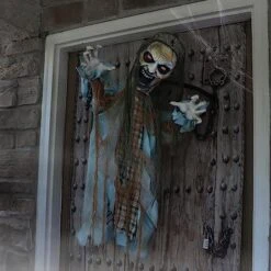 Haunted Hill Farm Dungeon Dave The Animatronic Twisting Zombie In Chains With Backdrop And Folding Door Hook For Scary Hanging Halloween Decoration -Department 56 Shop 51c34WvIIoL