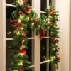 Hanizi 9 FT Christmas Garland, Battery Operated 8 Lighting Modes, Lighted Christmas Garland With 50 LEDs, Pine Cones, Red Berries -Department 56 Shop 51fzDrVX53L