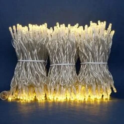 YULETIME 100 Feet 300 Count Warm White LED String Lights With 8 Models Adapter, 4" Spacing Plug-in Clear Wire Wide Angle 5mm Christmas Lights (Warm White - Multimode) -Department 56 Shop 51g2zTzfRkL. AC