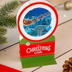 Hallmark Paper Wonder Christmas Card - Contemporary Musical 3D Pop-Up Santa And Sleigh Design -Department 56 Shop 51hudilGbwL