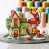 Department 56 North Pole Village A Stitch In Yule Time Animated Lit Building, 6.38 Inch, Multicolor 10 Department 56 North Pole Village A Stitch In Yule Time Animated Lit Building, 6.38 Inch, Multicolor -Department 56 Shop 51hvb9wenjL