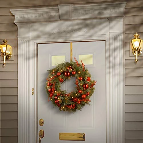 National Tree Company Pre-Lit Artificial Christmas Wreath, Green, Evergreen, White Lights, Decorated With Ball Ornaments, Red Sprigs, Christmas Collection, 24 Inches 1 National Tree Company Pre-Lit Artificial Christmas Wreath, Green, Evergreen, White Lights, Decorated With Ball Ornaments, Red Sprigs, Christmas Collection, 24 Inches