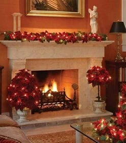 HOMESEASONS Pack Of 2 Pre-Lit Velvet Artificial Poinsettia 6 Feet Garland With Red Berries And Holly Leaves - 3AA Battery Operated Indoor And Outdoor Use (2, Red) -Department 56 Shop 51re88Jy2yL