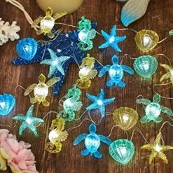 Ocean Beach Themed Sea Life Cute Fairy Decorative String Lights Battery Operated, Seahorse Starfish Sea Turtle Clam Nautical Rope Lights Lit By 30 LEDs 10 Ft For Holiday Camping Mermaid Wedding -Department 56 Shop 61XrHD0qJTL. AC