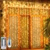 Ollny Curtain Lights For Bedroom - 200LED 6.6x6.6ft Fairy Lights Curtain With 8 Modes Timer Remote, USB Power, Waterproof Hanging String Lights For Backdrop Wedding Party Wall Decorations, Warm White -Department 56 Shop 61l9drFGbCL
