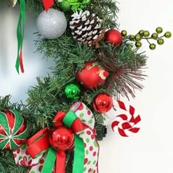 WBHome Pre-lit 24 Inch Artificial Christmas Wreath, Elf Green & Red Lighted Wreath With 35 LED Lights For Indoor Outdoor Front Door Window Xmas Decor Holiday Decorations, Battery Operated -Department 56 Shop 61lk3rzEcjL